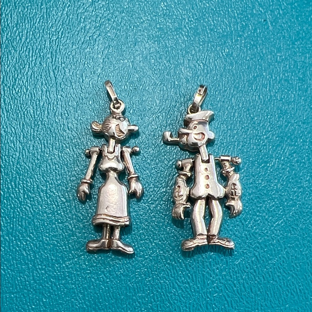 Sterling Silver Vintage Popeye and Olive Oyl pendants.